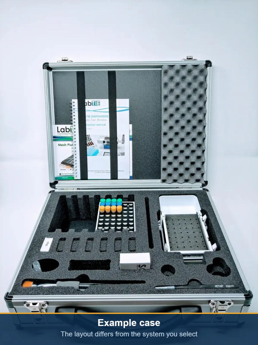 Open LabTIE transport case with the powder dispenser, mesh plate, converter, scrapers and manual in cut foam