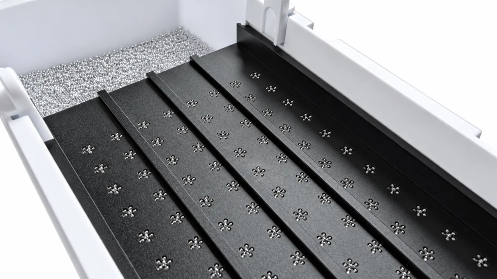 A 96 well mesh plate loaded with 0.8 mm silica beads, six per well, ready for bead beating